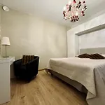 Flatsinroi شقة *